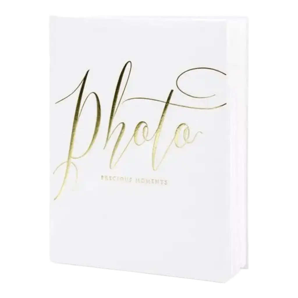 White photo album with gold lettering