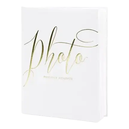 White photo album with gold lettering