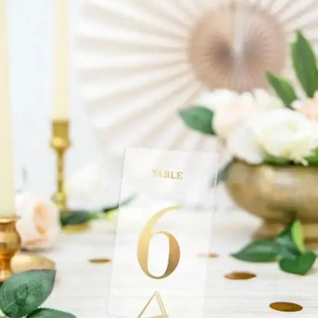 Gold table number on transparent card