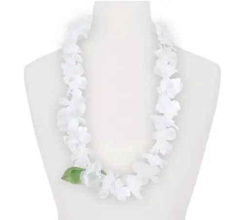 Hawaiian necklace with white flowers and green leaves